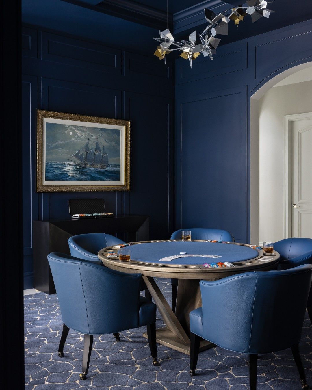 Navy and copper table-game salon